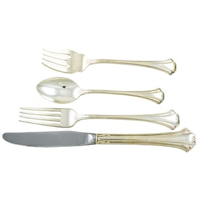 A Reed & Barton sterling flatware service in the Chippendale pattern