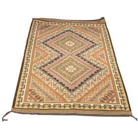 A Navajo flatweave blanket by Lena Begay
