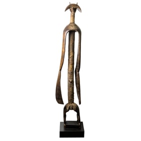 A tall African tribal figure