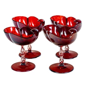 A set of four Continental ruby glass cut to clear comports