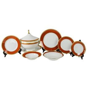 An extensive Ginori porcelain assembled dinner service with rust red and gilt bands