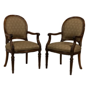 A pair of French Neoclassical style salon fauteuils