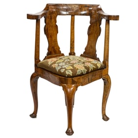 A George II figured walnut corner chair
