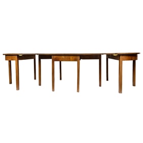 A Regency three part walnut banquet table circa 1820