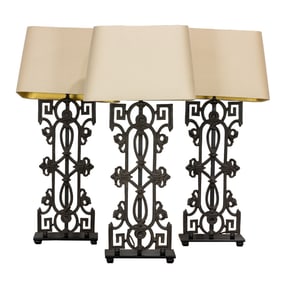 A set of three iron table lamps