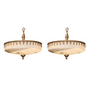 A pair of Gothic Revival style metal and glass hanging light fixtures circa 1930