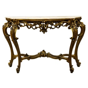 A Rococo style giltwood console table