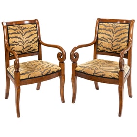 A pair of Empire style armchairs