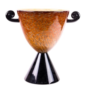 A large Cohn Stone tortoiseshell glass urn