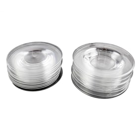 A group of Steuben glass plates and low bowls