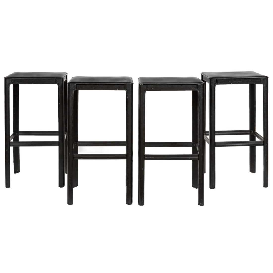 A set of four Italian Matteo Grassi black leather clad steel stools: A set of four Italian Matteo Grassi black leather clad steel stools, molded factory mark and applied labels, 28.5"h x 15.5"w x 15.5"d