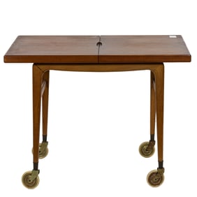 A Danish Modern teak and oak expanding tea/bar cart designed by Kurt Ostervig for  Jason Mobler