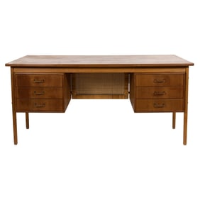 A Danish Modern teak, oak and caned desk designed by Torben Strandgaard M.A.A. for Mobelfabriken