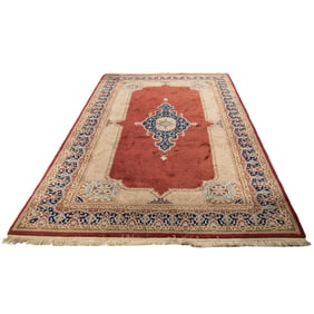 An antique Persian Kerman carpet