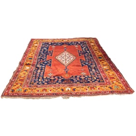 An antique Caucasian carpet