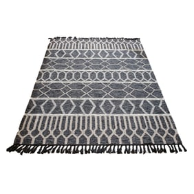 A contemporary hand made flat weave carpet