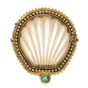 A mother-of-pearl, garnet, and 14k gold ring