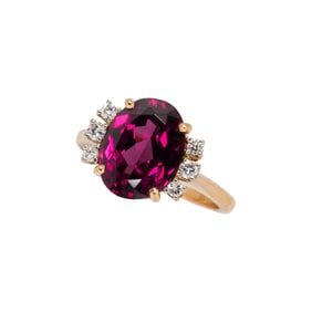 A rhodolite garnet, diamond, and 18k gold jewelry suite