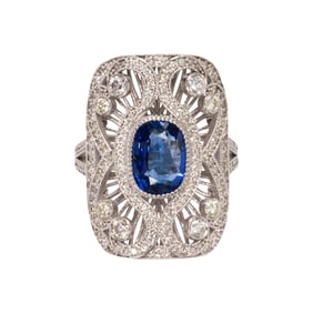 A sapphire, diamond and 14k white gold ring