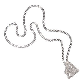 A diamond and platinum pendant with 14k white gold chain