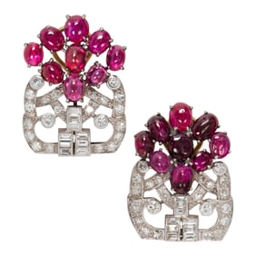A pair of ruby, diamond, platinum, and 10k gold earrings