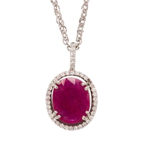 A ruby, diamond and 14k white gold pendant-necklace