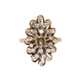 A diamond and 14k gold semi-mount ring