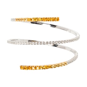 A sapphire, diamond, and 18k bi-color gold bracelet