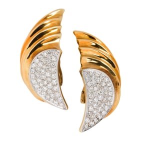 A pair of diamond and 18k bi-color gold ear clips