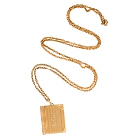A 14k gold locket pendant necklace