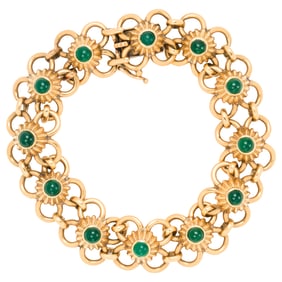 An emerald and 18k gold bracelet