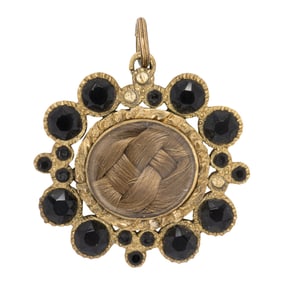 A Victorian 14k gold mourning pendant