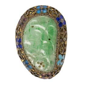 A jade, enamel, and 10k gold ring