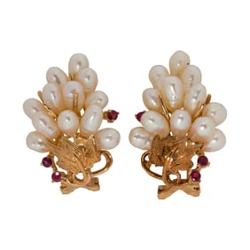 A pair of cutlured pearl, ruby, and 14k gold earrings