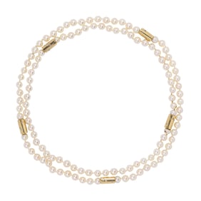 A cultured pearl, diamond, and 18k gold necklace