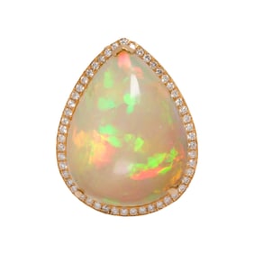 An Opal, Diamond, and 18k Gold Ring
