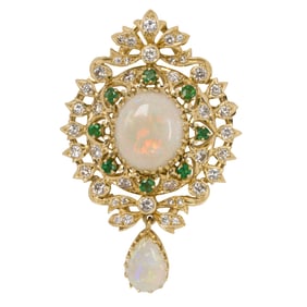 An opal, diamond, emerald and 14k gold pendant