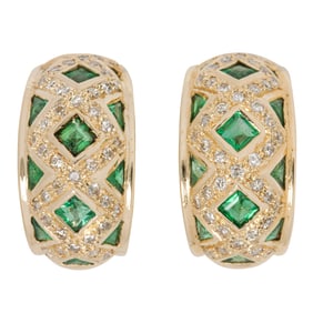A pair of emerald, diamond, and 14k gold earclips