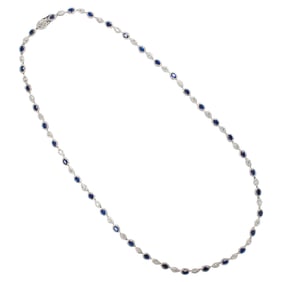A diamond, sapphire, and 14k white gold necklace