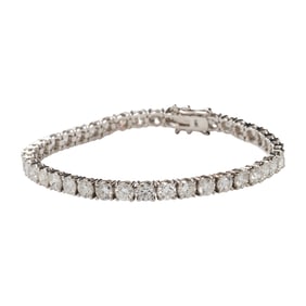 A diamond and 14k white gold tennis bracelet