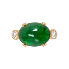 A diamond, emerald, and 18k gold ring