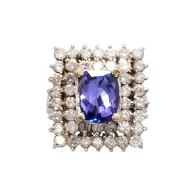 A tanzanite, diamond, and 14k white gold ring