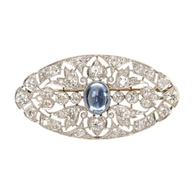 A sapphire, diamond and platinum brooch