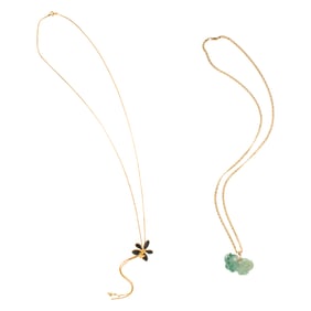 A jade and 14k pendant necklace and gold toned bolo tie
