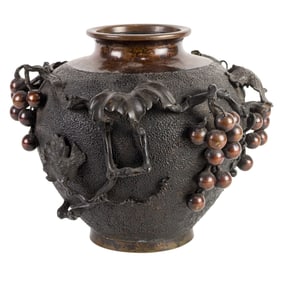 A Japanese patinated bronze 'grape vine' vase