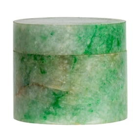 A Chinese green jadeite cylindrical dresser box