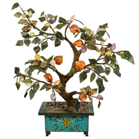 A Chinese cloisonne planter with jade peach tree