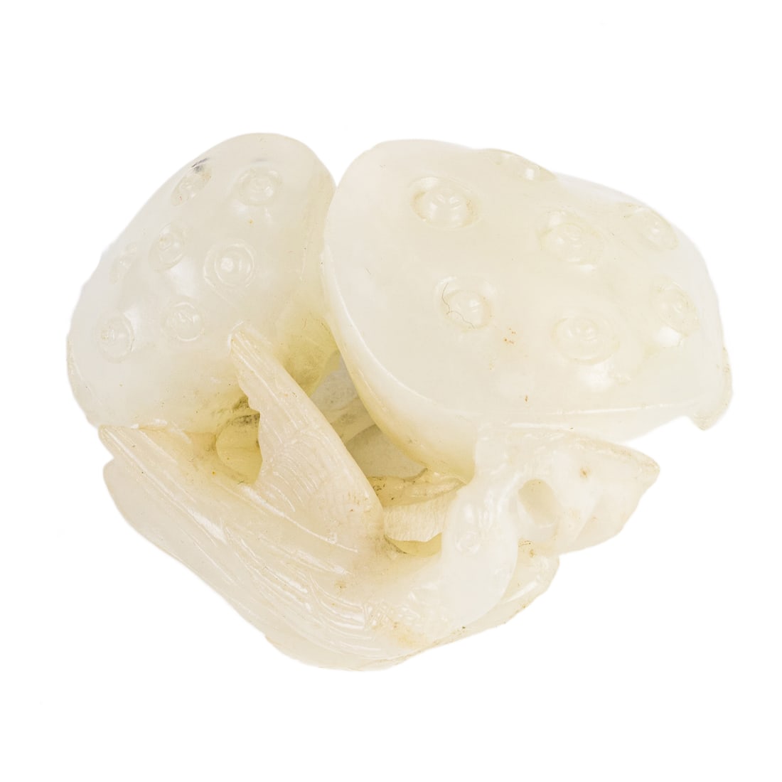 A Chinese white jade 'lotus pod' toggle (1 of 2)