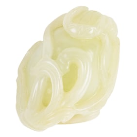 A Chinese celadon jade 'lotus pod' toggle