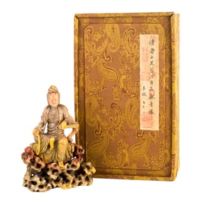 A Chinese soapstone Guanyin and stand